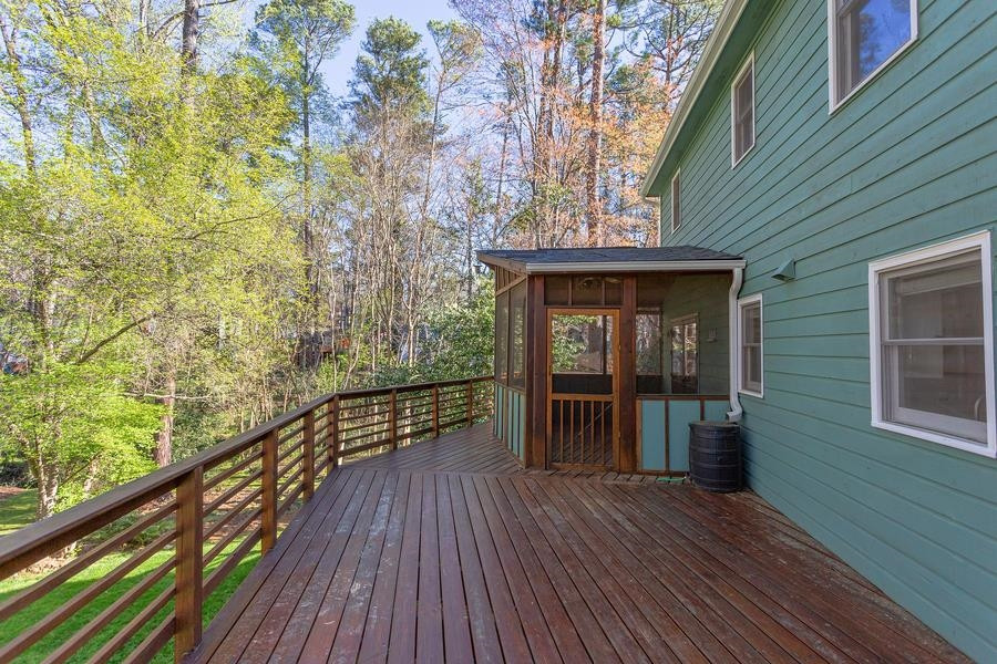 7533 Milestone Court Raleigh, NC 27615 - Photo 32 of 51 Deck and screened porch