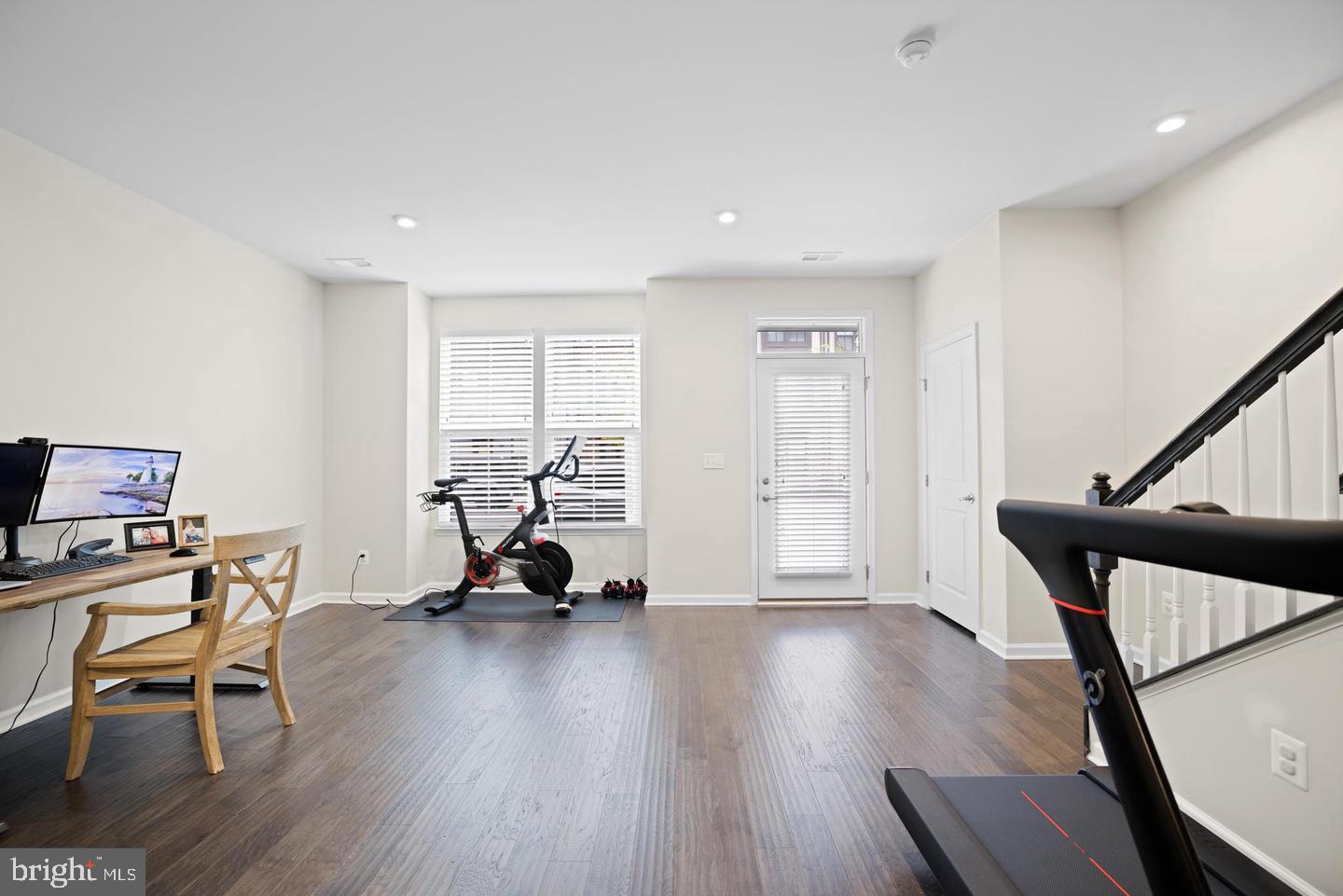 22255 Sims Terrace Ashburn, VA 20148 - Photo 3 of 27 a living room with furniture and a wooden floor