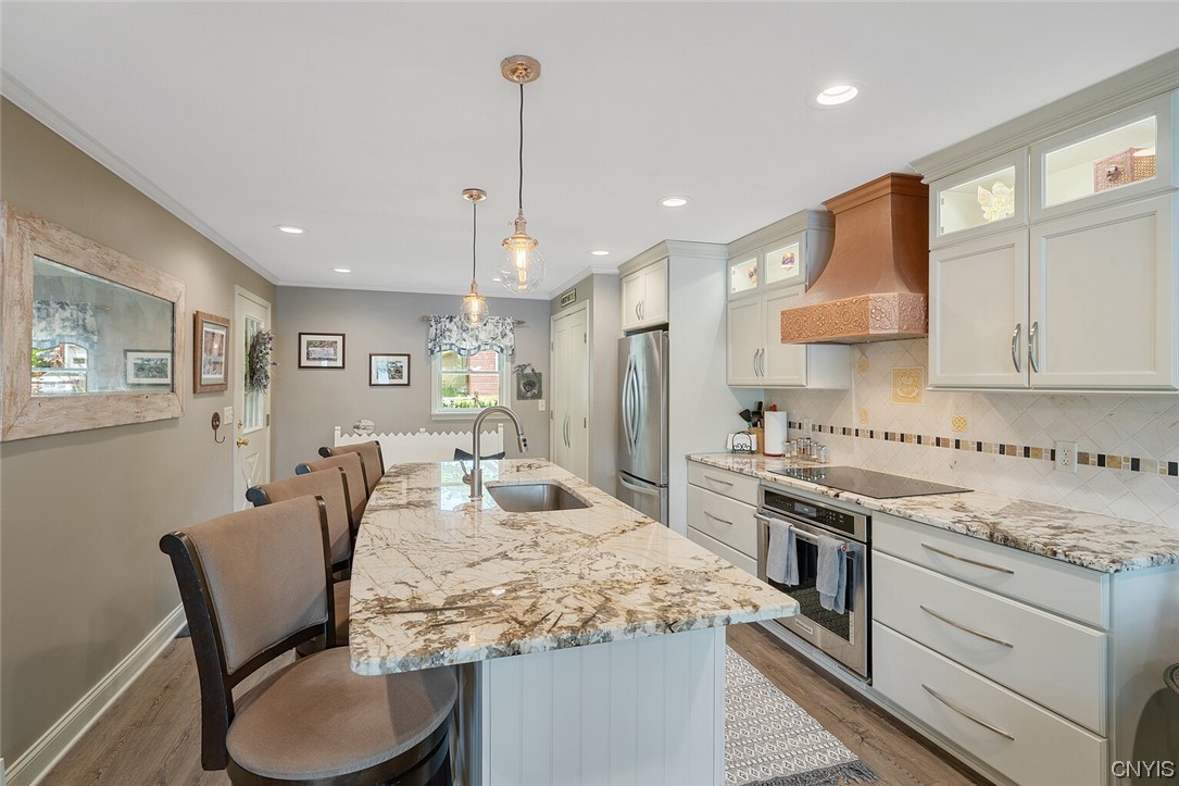 1932 Rittenhouse Square Tully, NY 13159 - Photo 11 of 42 Plenty of room to entertain around the new island!