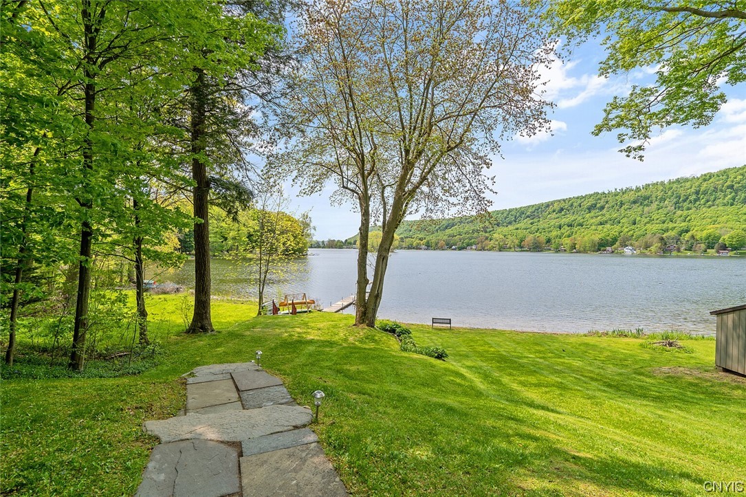 1932 Rittenhouse Square Tully, NY 13159 - Photo 13 of 42 New stone walkway to take you to the lake