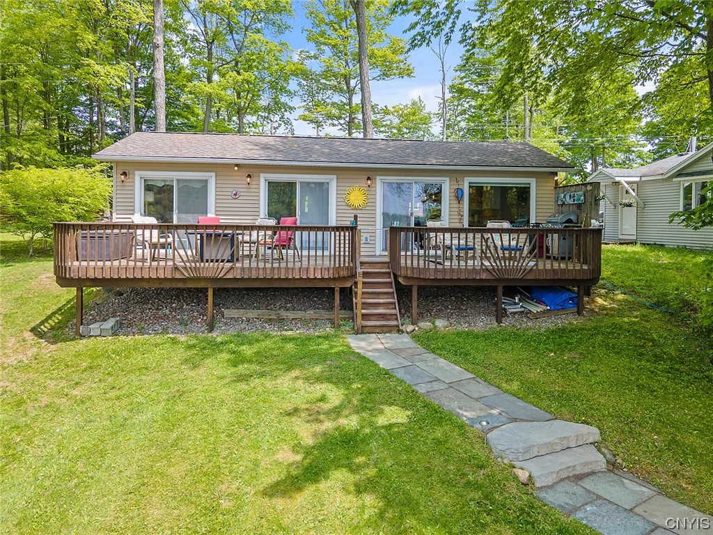 1932 Rittenhouse Square Tully, NY 13159 - Photo 22 of 42 Three Andersen sliding glass doors out to the deck
