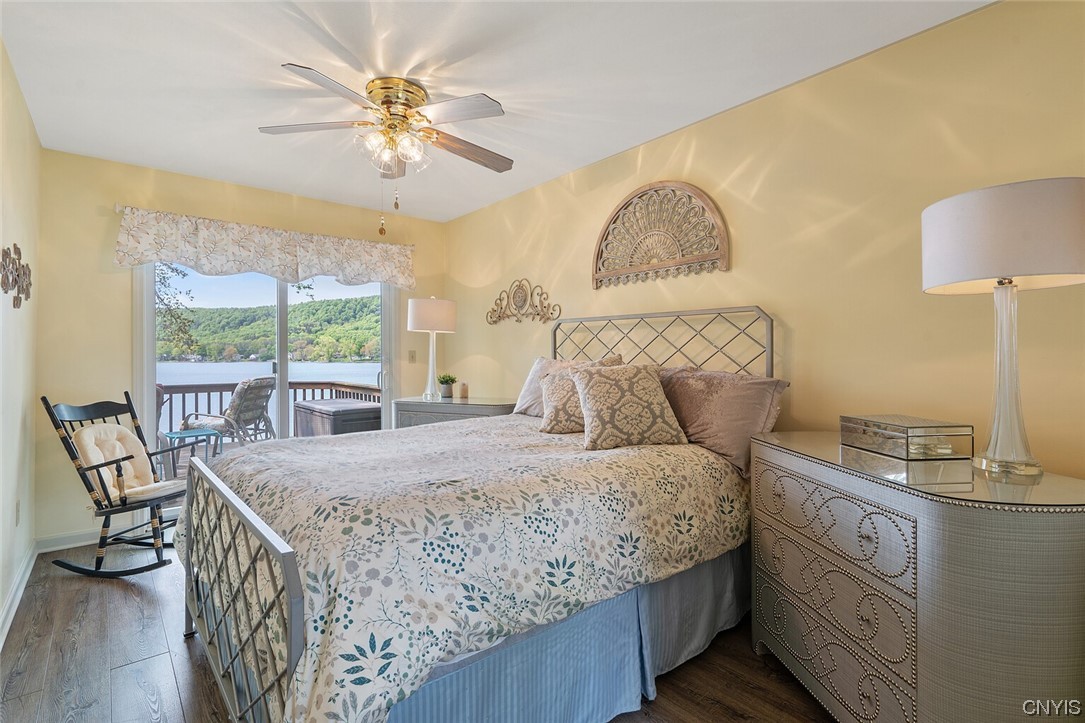 1932 Rittenhouse Square Tully, NY 13159 - Photo 24 of 42 Wake up in the primary bedroom to beautiful lake v