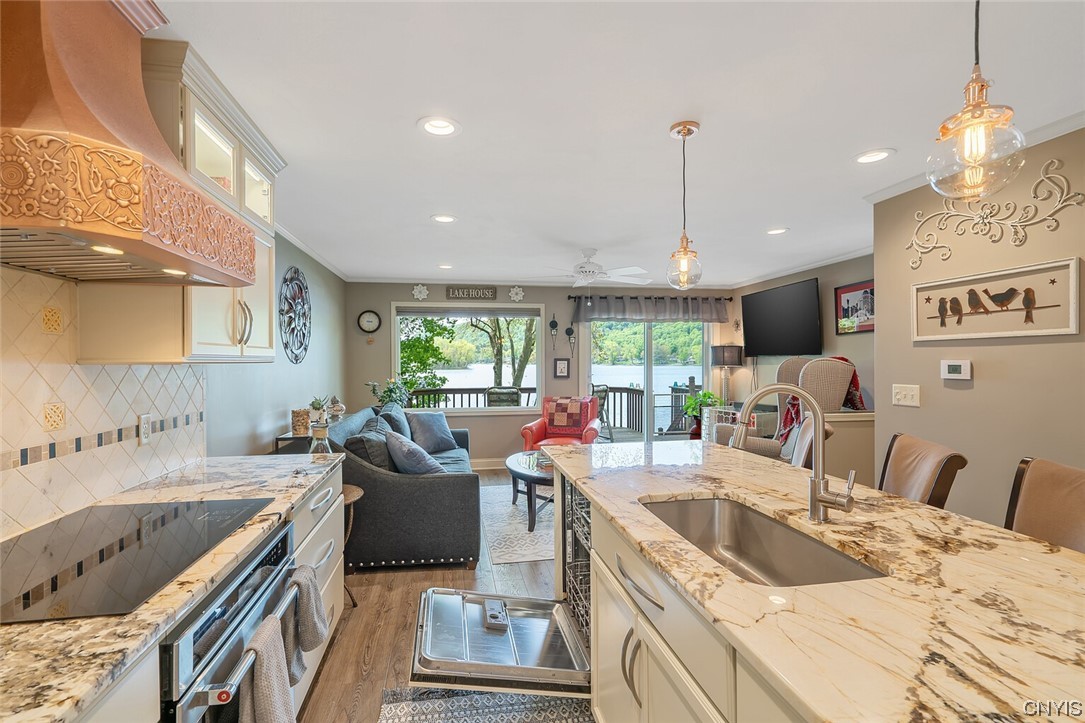 1932 Rittenhouse Square Tully, NY 13159 - Photo 8 of 42 Wall removed to open the kitchen to the great room