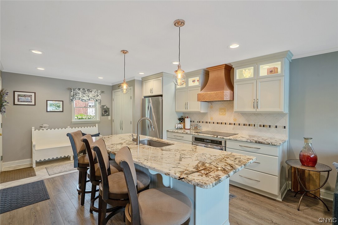 1932 Rittenhouse Square Tully, NY 13159 - Photo 9 of 42 New island and newer stainless steel appliances