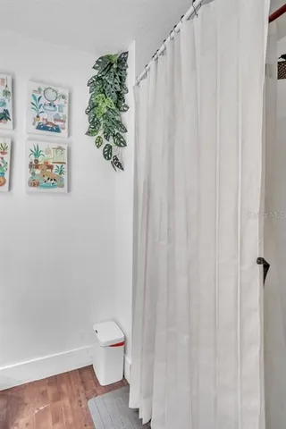 a kitchen with stainless steel appliances a sink a refrigerator and cabinets