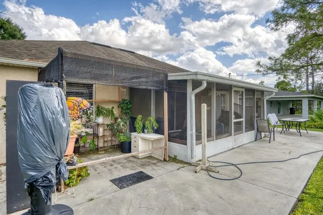 a swimming pool with trees in the background