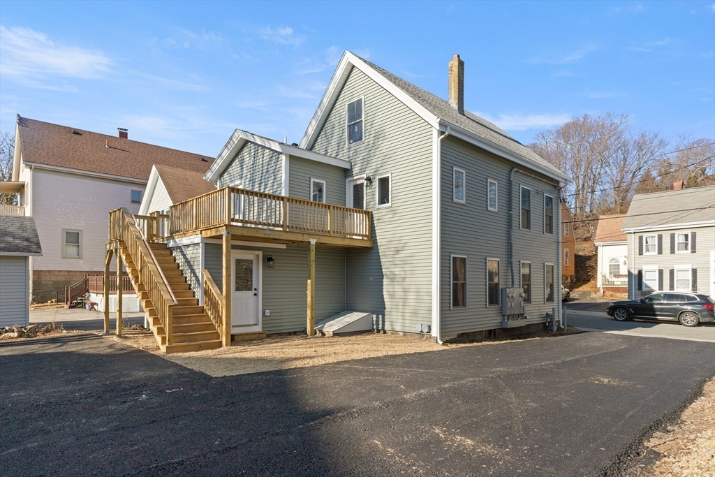 20 Beacon Street Gloucester, MA 01930 - Photo 2 of 35 a view of a house with a street