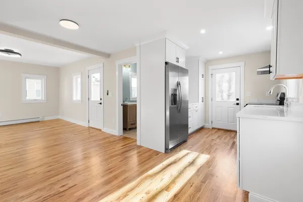 a kitchen with stainless steel appliances granite countertop a stove and a sink