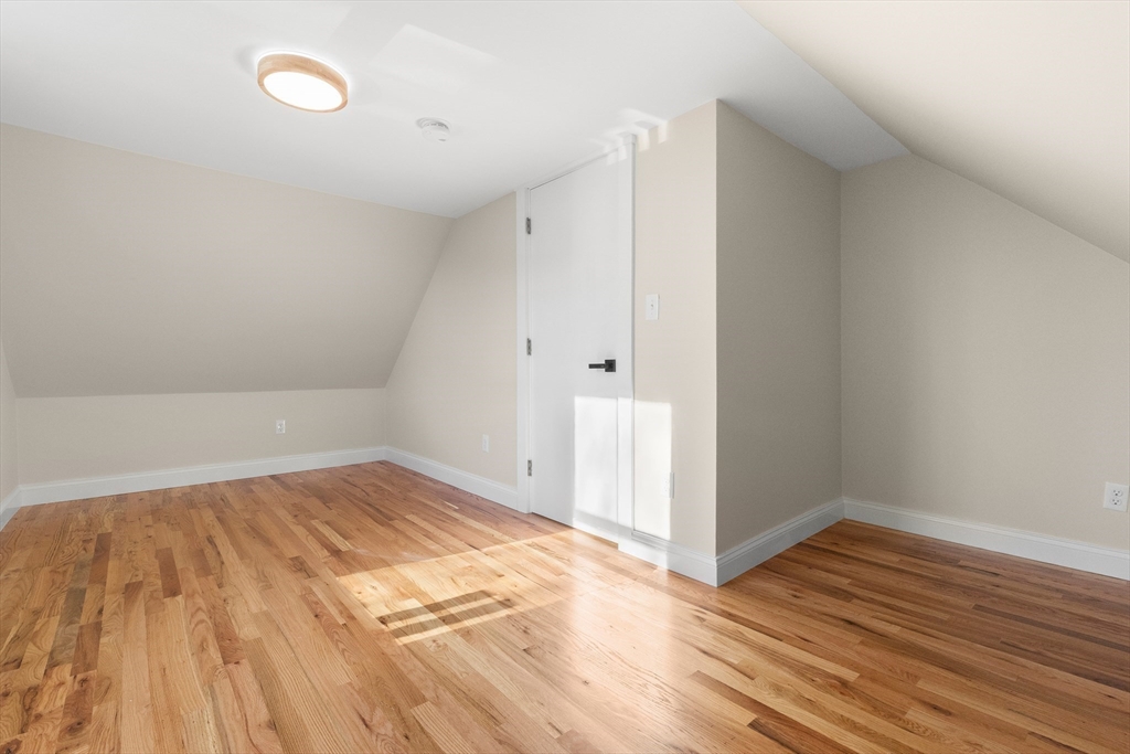 20 Beacon Street Gloucester, MA 01930 - Photo 31 of 35 a view of empty room with wooden floor