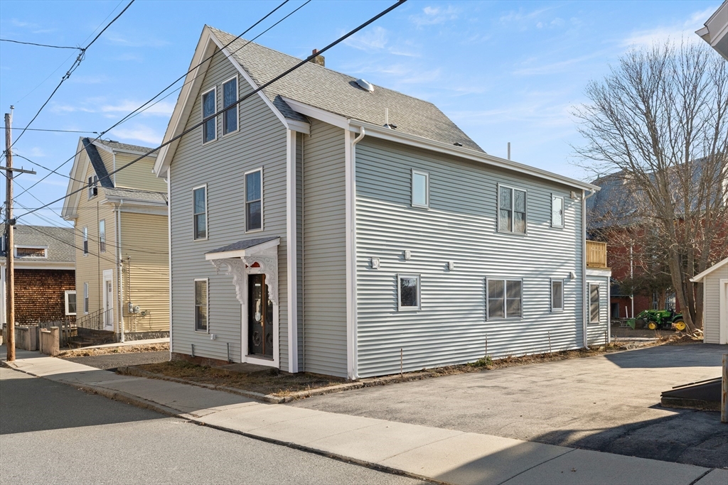 20 Beacon Street Gloucester, MA 01930 - Photo 34 of 35 a view of a house with a street