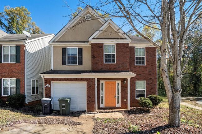 812 Crescent Way Griffin, GA 30224 - Photo 1 of 1 a front view of a house with a yard