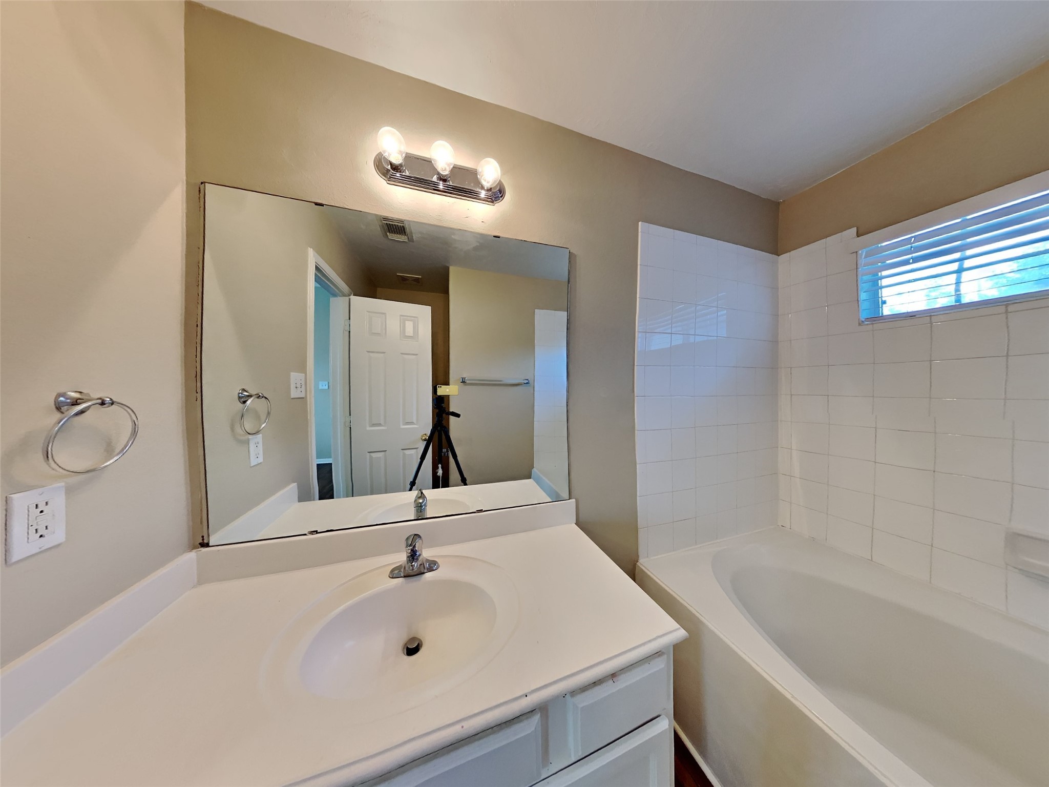 3719 Forney Ridge Lane Houston, TX 77047 - Photo 12 of 21 a bathroom with a sink and a bathtub