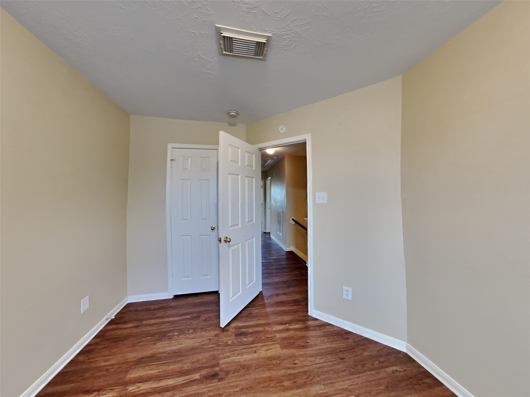 3719 Forney Ridge Lane Houston, TX 77047 - Photo 17 of 21 a view of a hallway with wooden floor