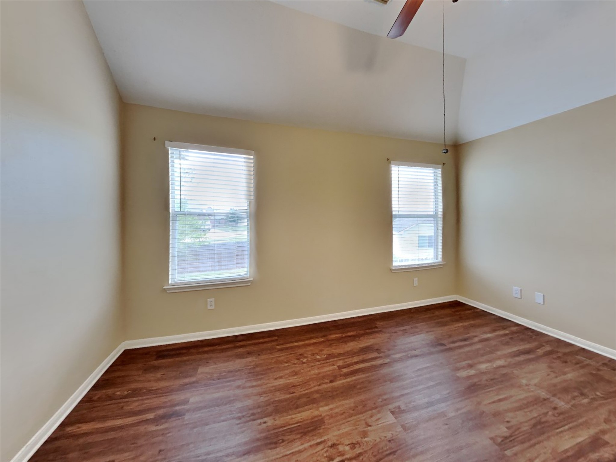 3719 Forney Ridge Lane Houston, TX 77047 - Photo 9 of 21 an empty room with wooden floor and windows