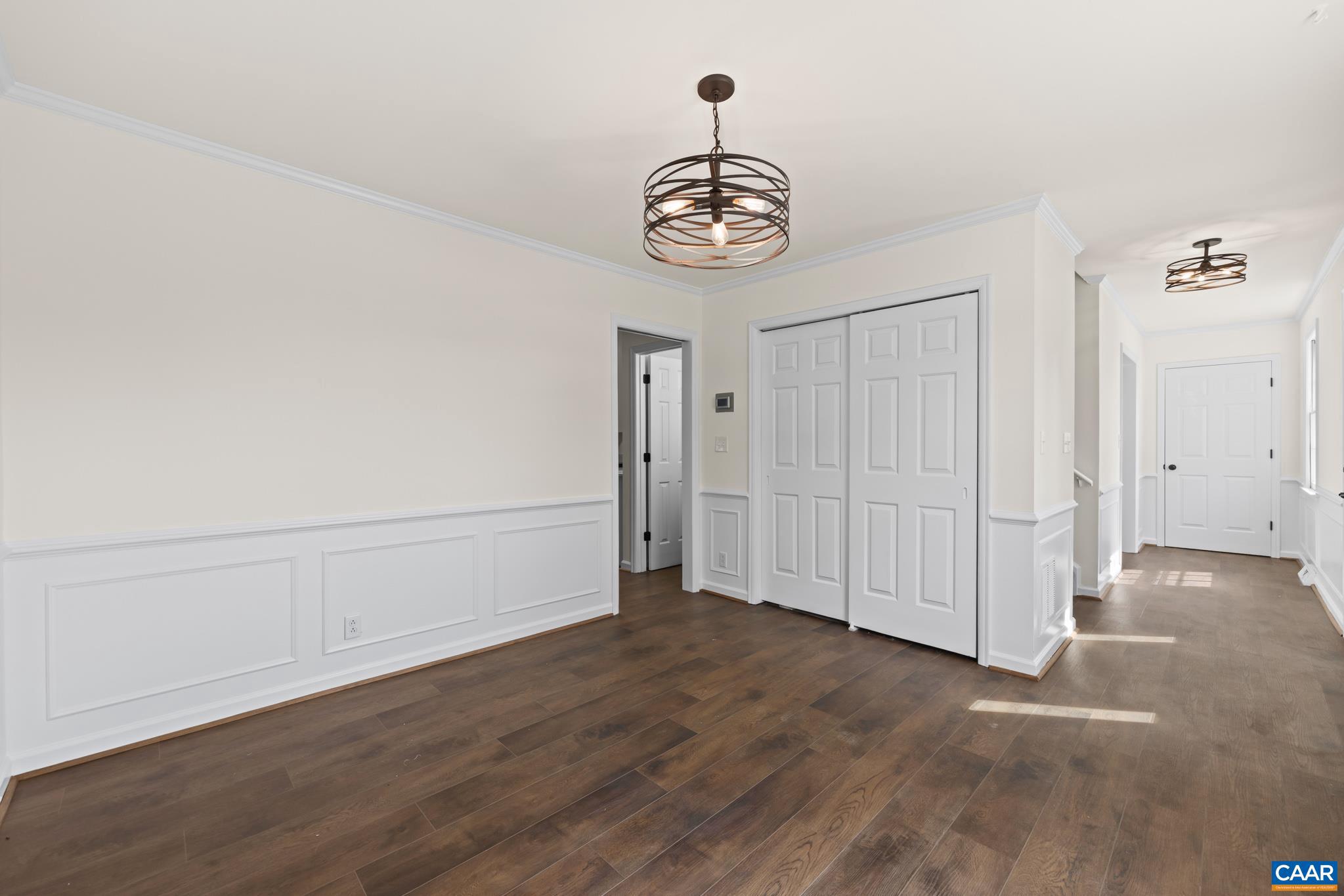 1941 Michael Place Charlottesville, VA 22901 - Photo 11 of 52 a view of an empty room with wooden floor