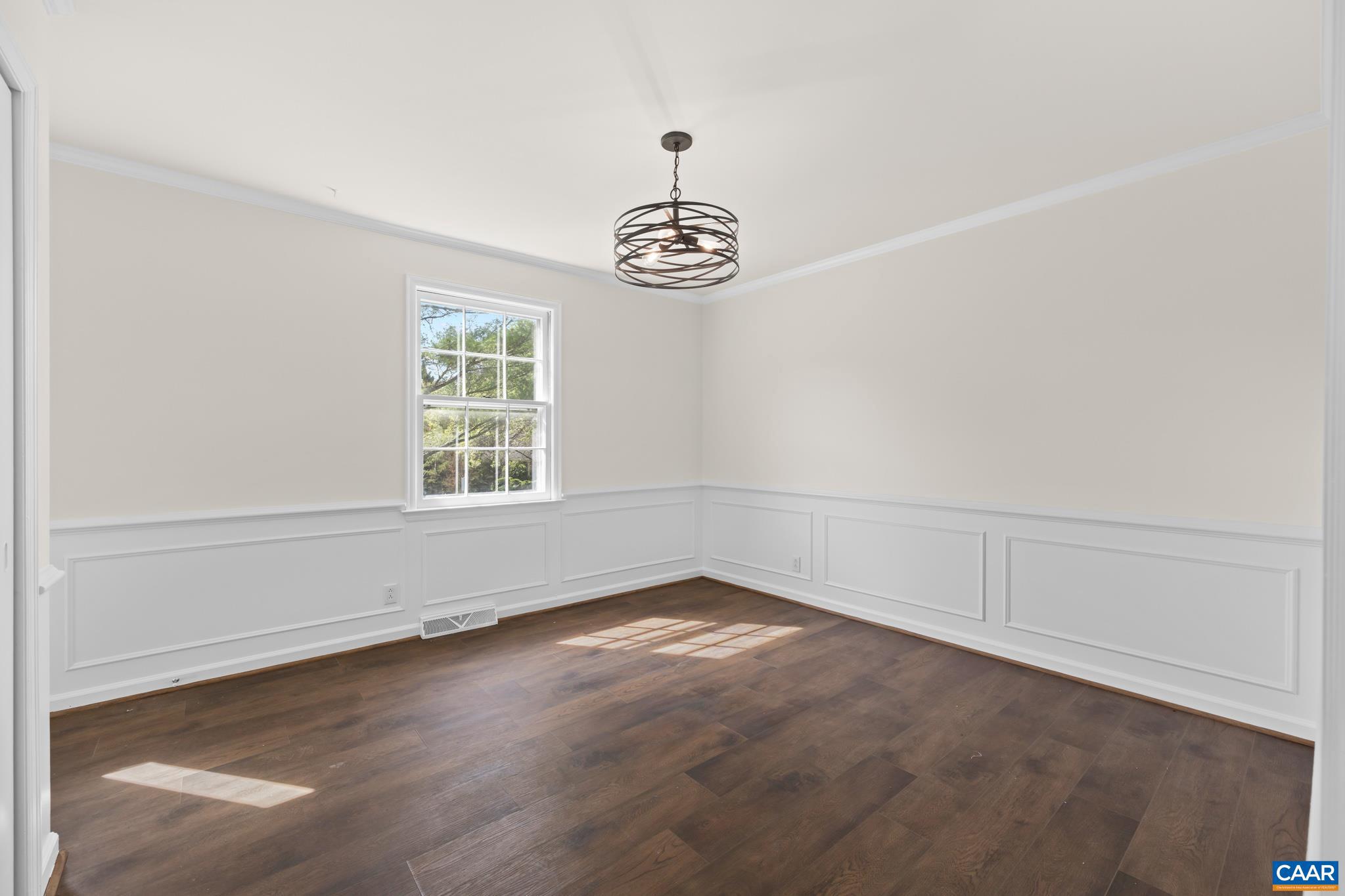 1941 Michael Place Charlottesville, VA 22901 - Photo 12 of 52 an empty room with wooden floor cabinet and windows