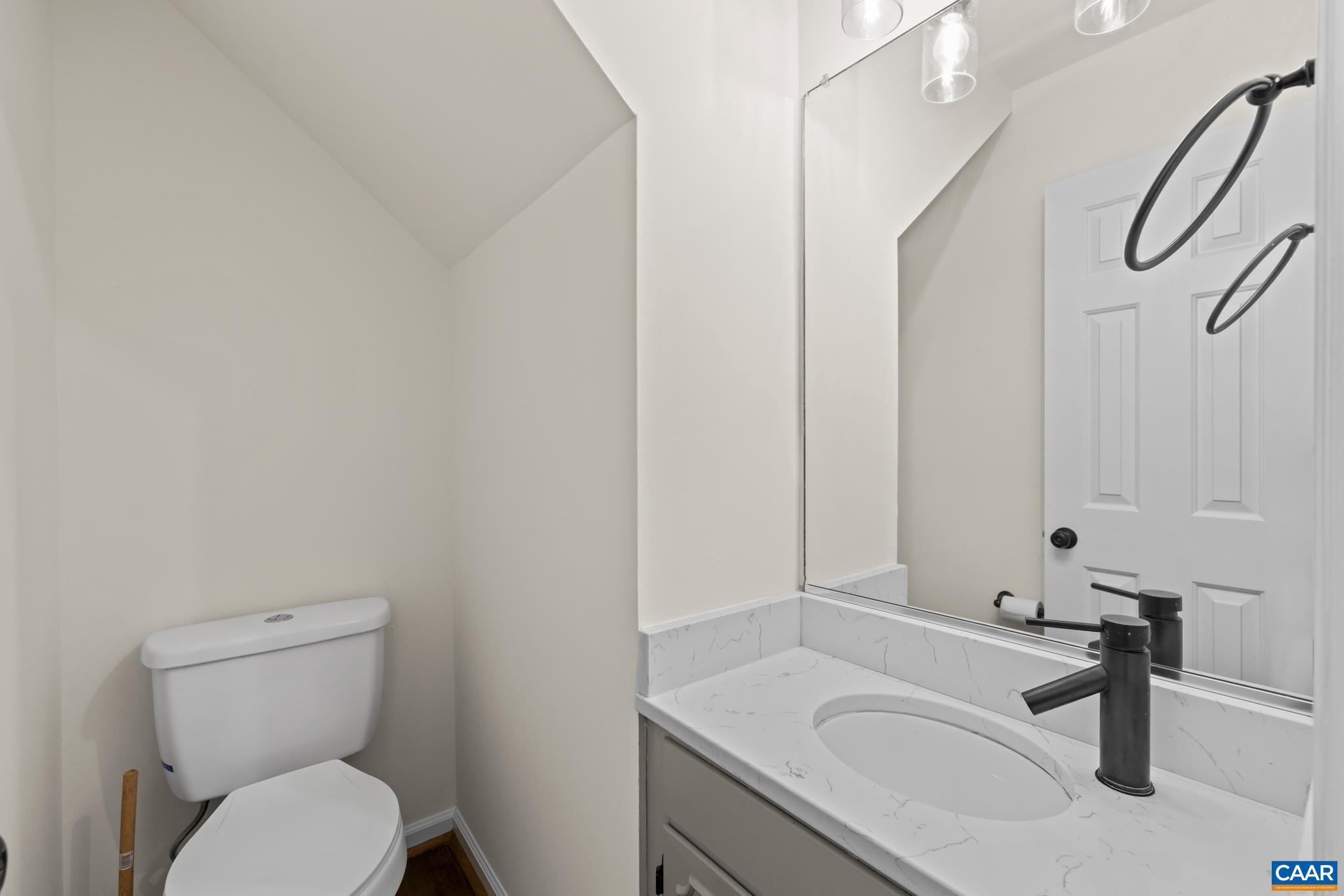 1941 Michael Place Charlottesville, VA 22901 - Photo 20 of 52 a bathroom with a sink a toilet and a mirror