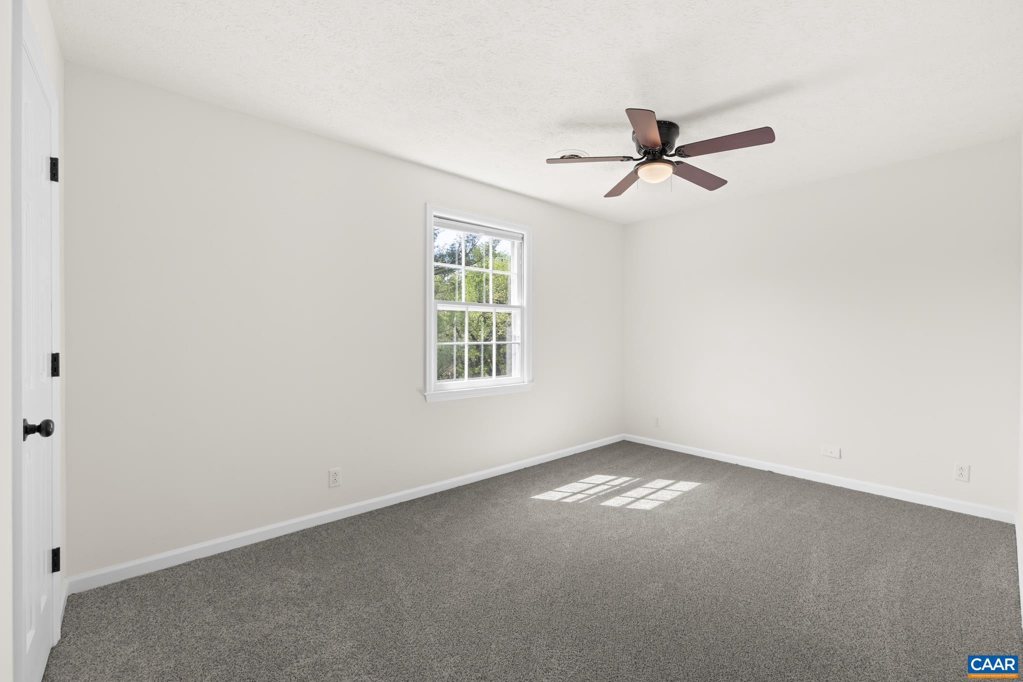 1941 Michael Place Charlottesville, VA 22901 - Photo 34 of 52 an empty room with windows and fan