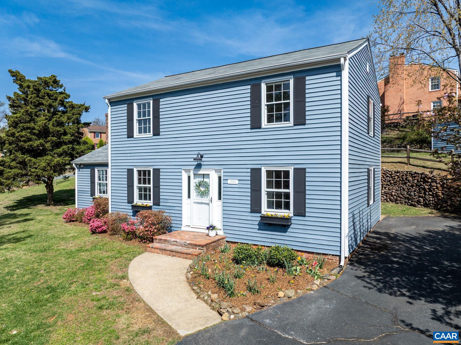 1941 Michael Place Charlottesville, VA 22901 - Photo 4 of 52 a front view of a house with garden