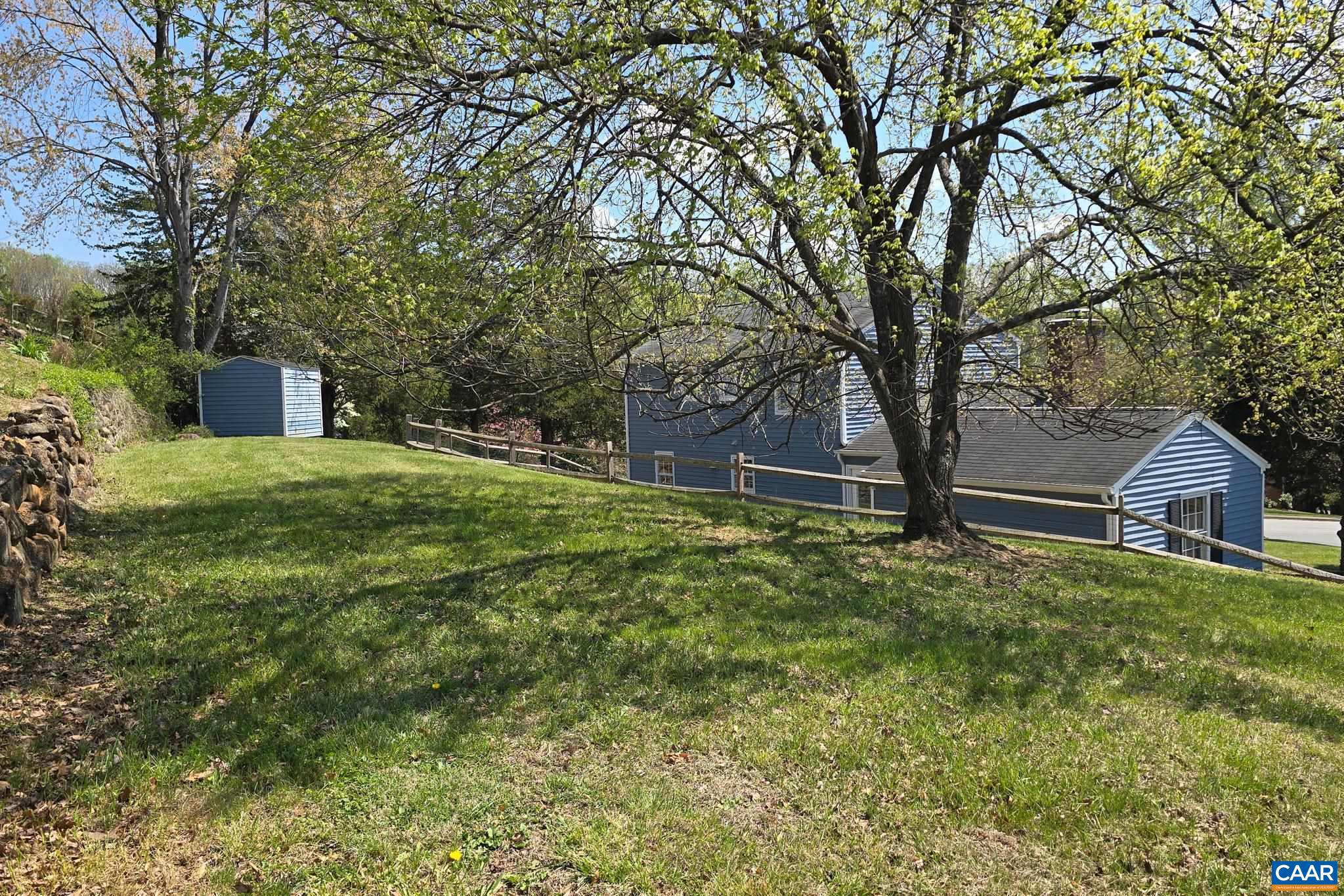 1941 Michael Place Charlottesville, VA 22901 - Photo 48 of 52 a backyard of a house with lots of green space