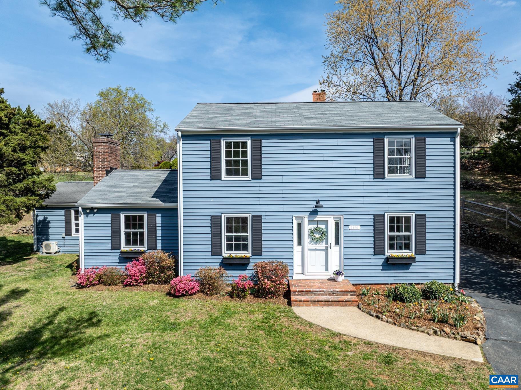 1941 Michael Place Charlottesville, VA 22901 - Photo 5 of 52 a front view of a house with garden