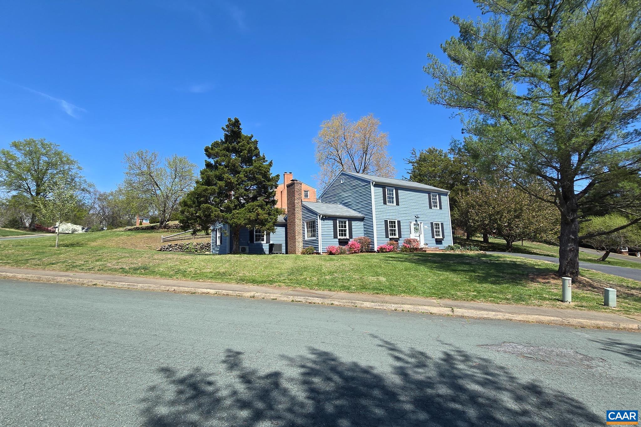 1941 Michael Place Charlottesville, VA 22901 - Photo 51 of 52 a view of a big house with a big yard and large trees