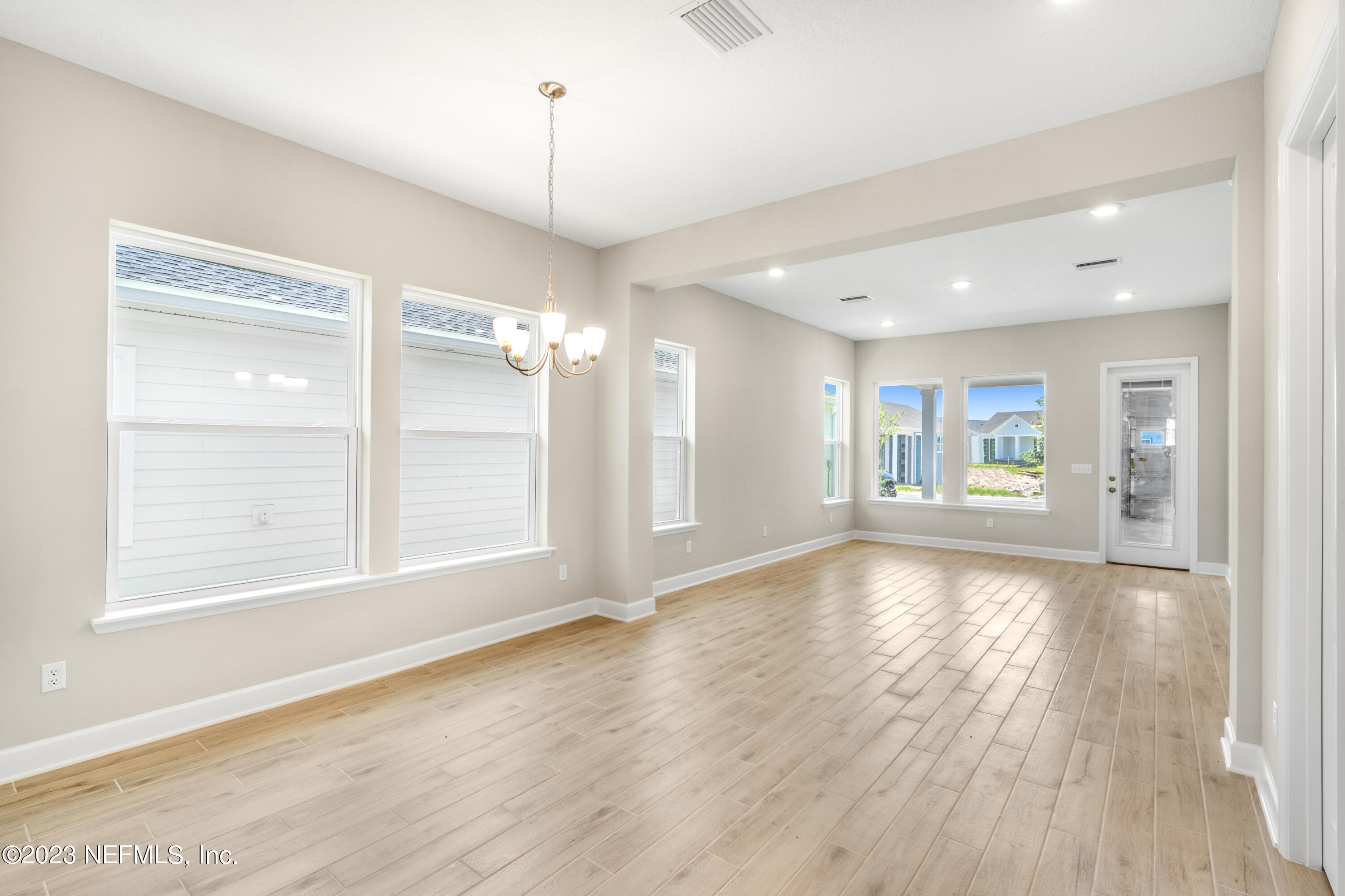 92 Alston Drive St. Augustine, FL 32092 - Photo 7 of 14 a view of livingroom with hardwood floor and window