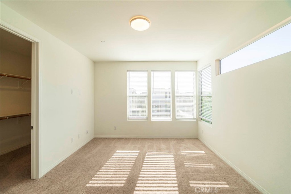 209 Merit Irvine, CA 92618 - Photo 13 of 39 a view of an empty room with a window