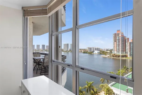 a bathroom with a sink toilet a mirror and shower