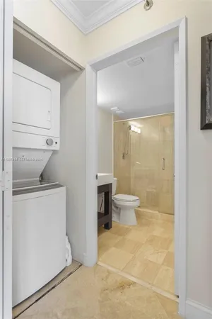 a bathroom with a double vanity sink a mirror and a shower