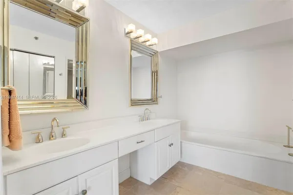 a view of a backyard with sitting area