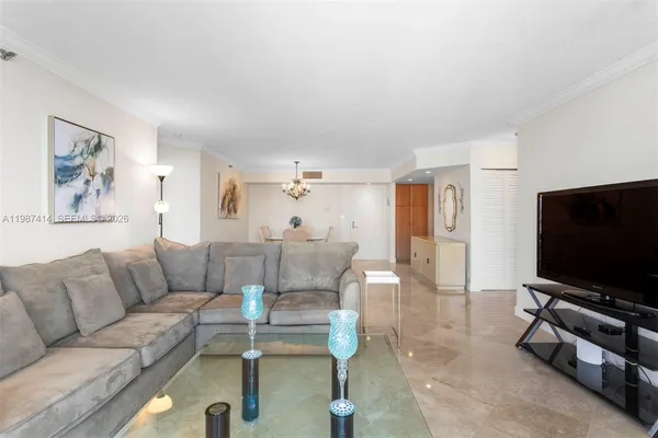 a living room with furniture and a couch