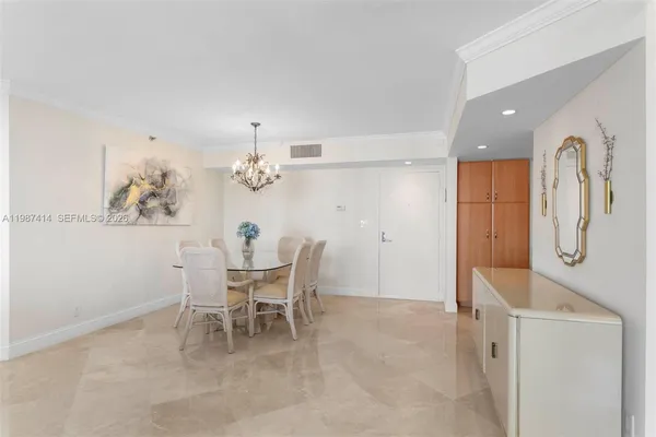 a kitchen with stainless steel appliances a stove a sink and a microwave