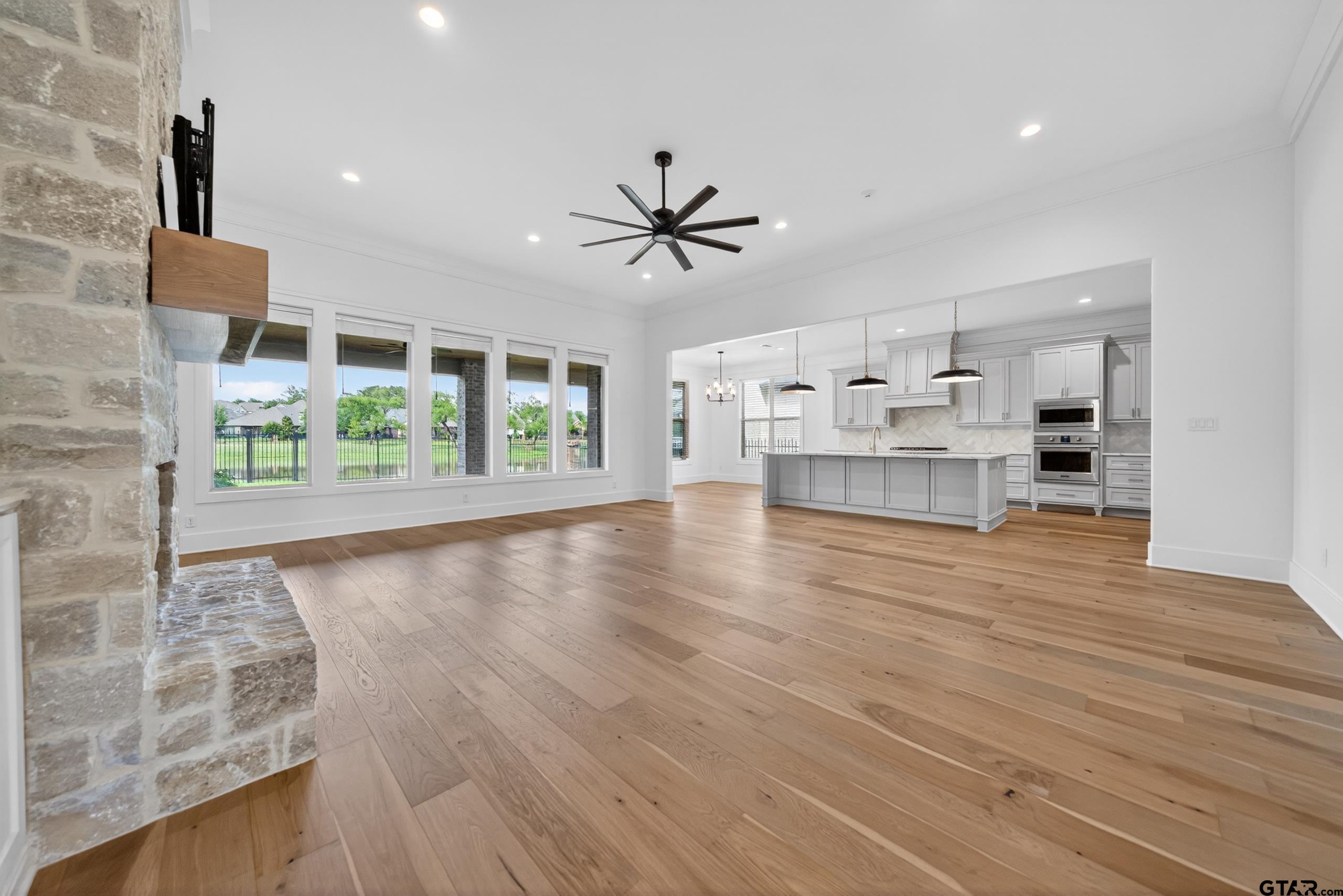 7517 Cross Gate Way Tyler, TX 75703 - Photo 12 of 47 a view of workspace with wooden floor and a window