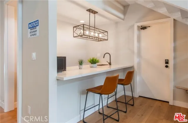 a swimming pool with outdoor seating