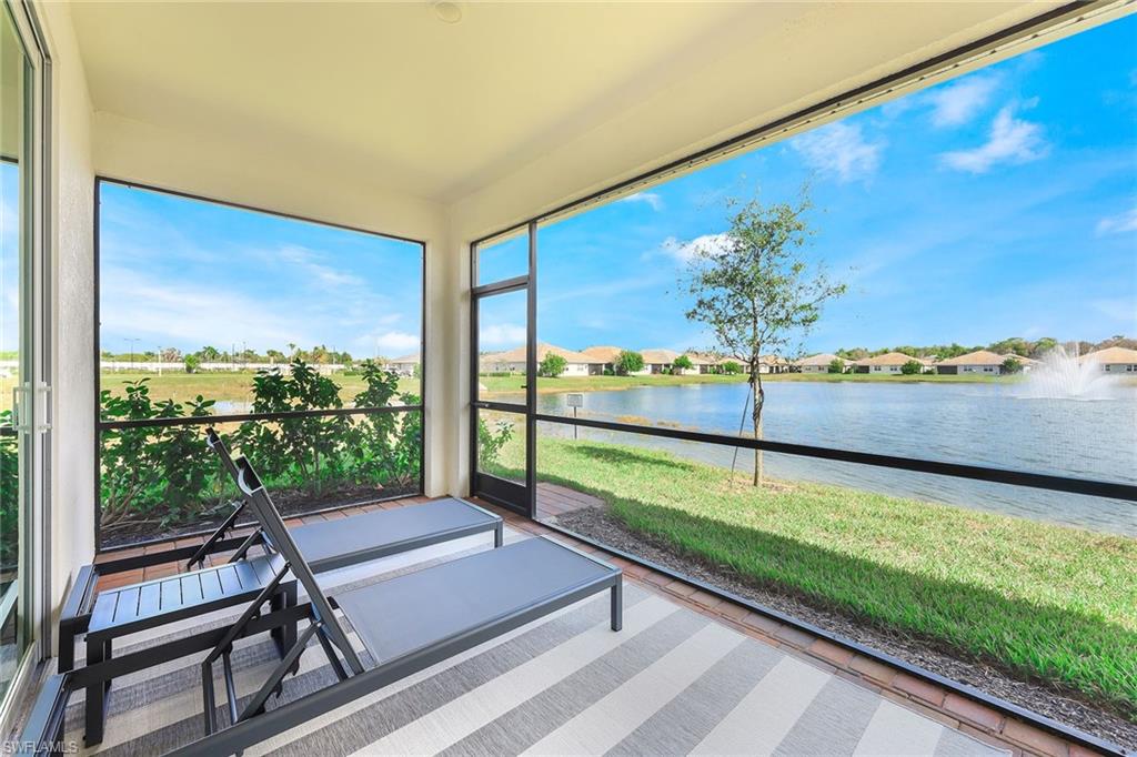 1114 Tranquil Brook Drive Naples, FL 34114 - Photo 22 of 32 a view of a balcony with chairs