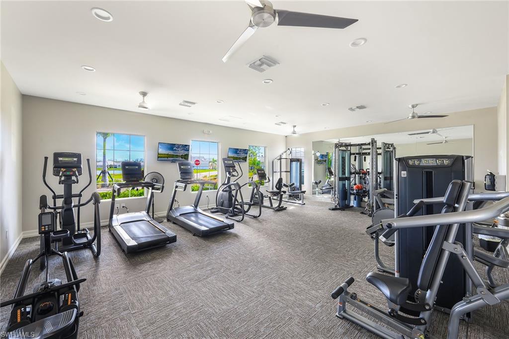 1114 Tranquil Brook Drive Naples, FL 34114 - Photo 30 of 32 a view of a room with gym equipment