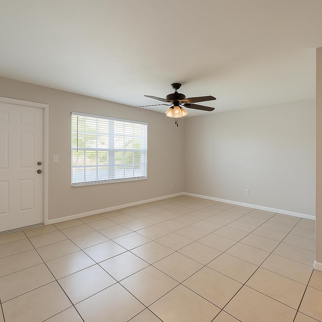 4670 Northeast 5th Avenue, Unit 15 Boca Raton, FL 33431 - Photo 2 of 9 a view of an empty room with a window