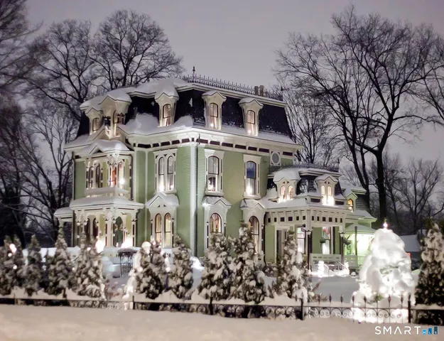 a view of a street with sitting area