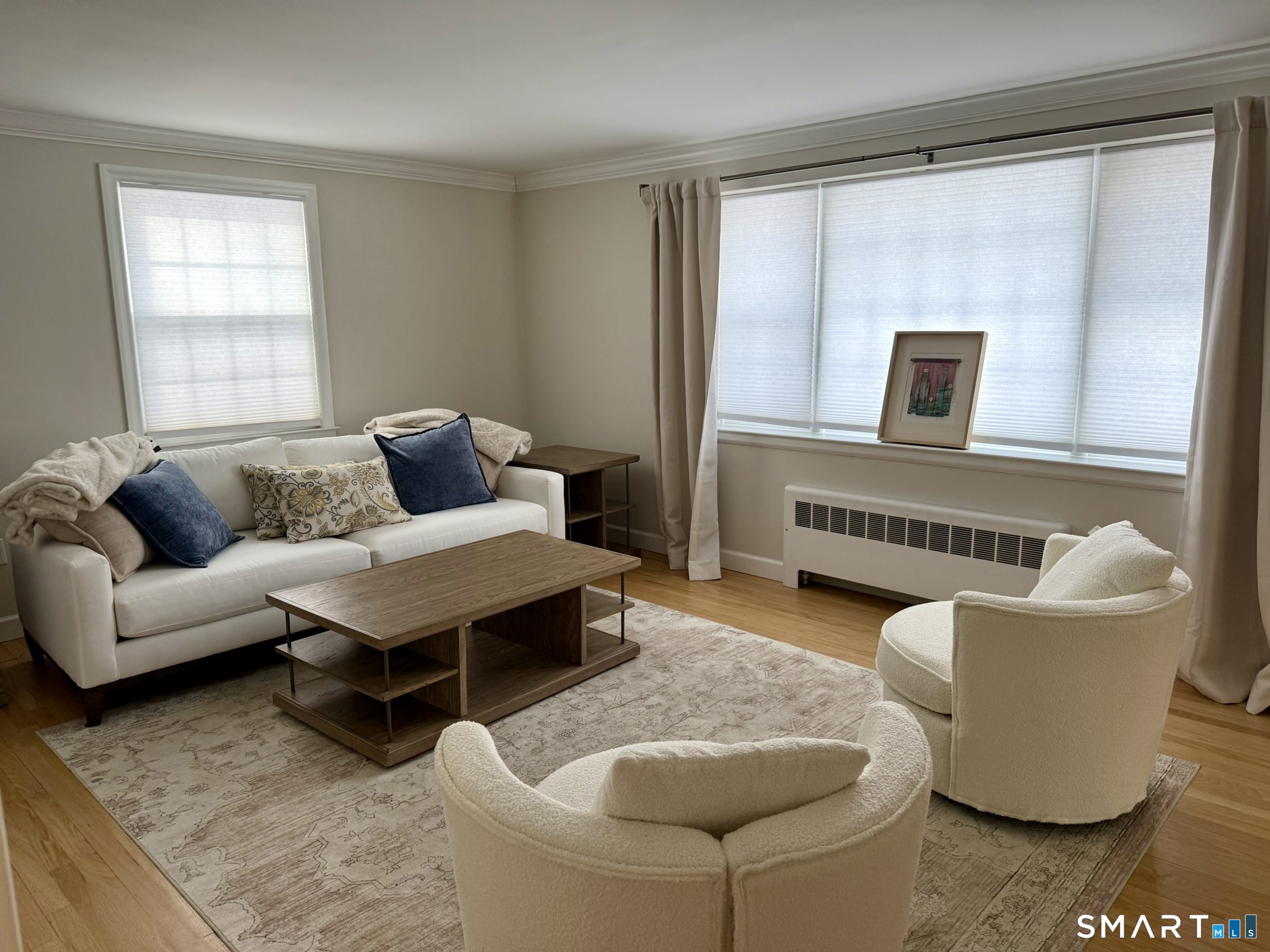 24 Elm Street Wethersfield, CT 06109 - Photo 9 of 24 a living room with furniture and a window
