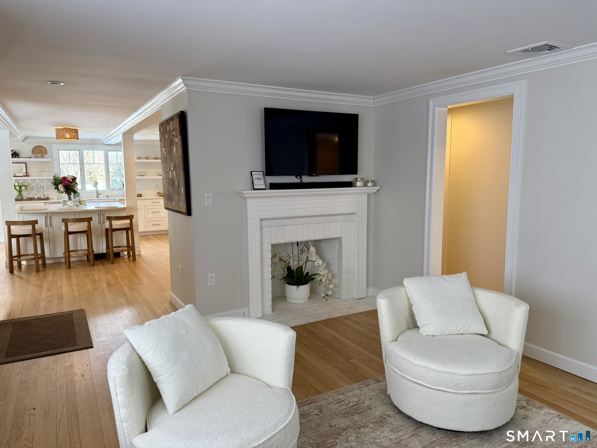 24 Elm Street Wethersfield, CT 06109 - Photo 10 of 24 a living room with furniture and a flat screen tv