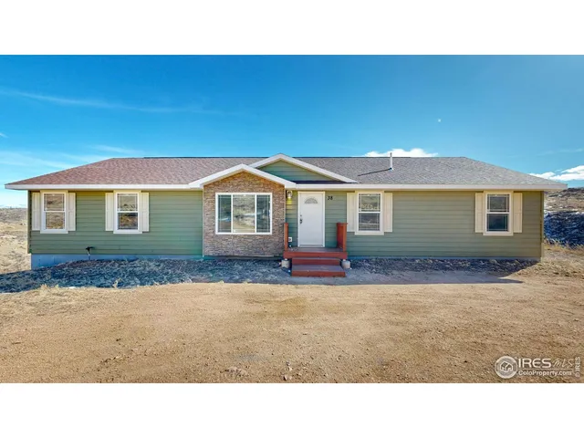 a black and white photo of a house