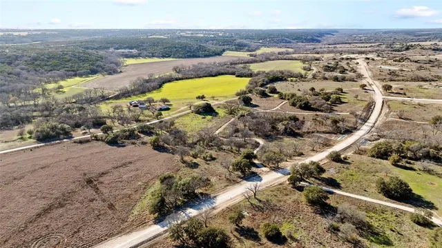an aerial view of beach and residential space