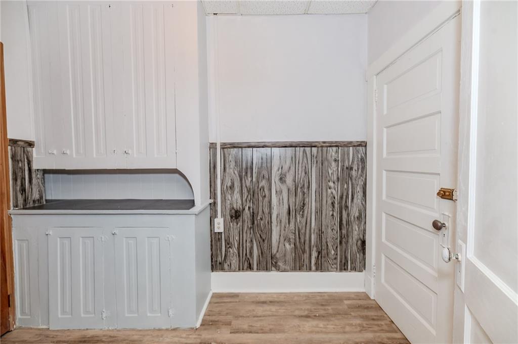 234 6th Street Clymer, PA 15728 - Photo 11 of 29 a bathroom with a granite countertop sink and a bathtub