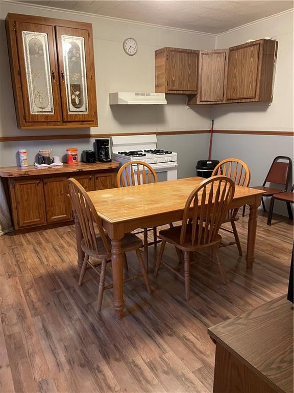 234 6th Street Clymer, PA 15728 - Photo 19 of 29 a kitchen with stainless steel appliances granite countertop a dining table chairs and granite counter tops