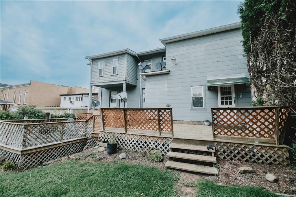 234 6th Street Clymer, PA 15728 - Photo 27 of 29 front view of a house with a large gate
