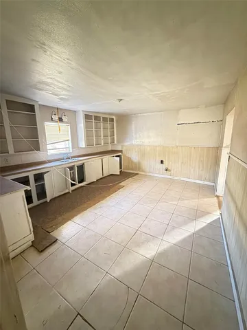 a view of a livingroom with wooden floor