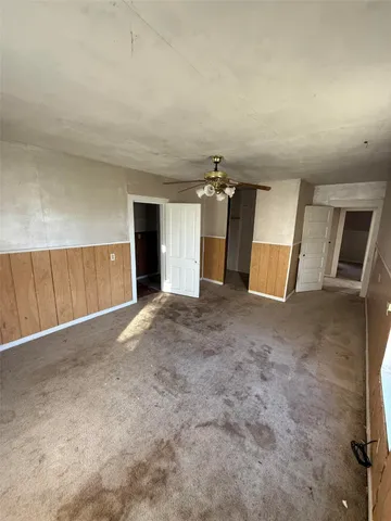 a bathroom with a shower and a toilet