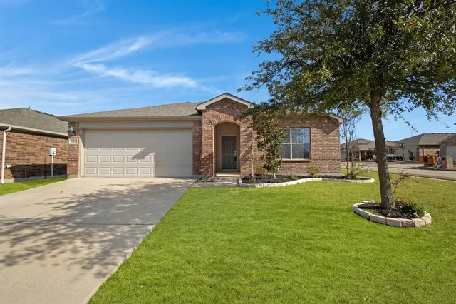 a front view of a house with swimming pool
