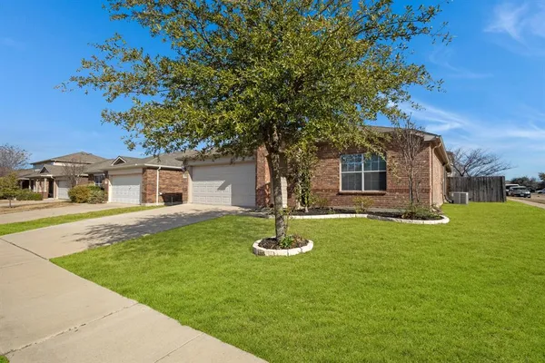 a house view with a garden space